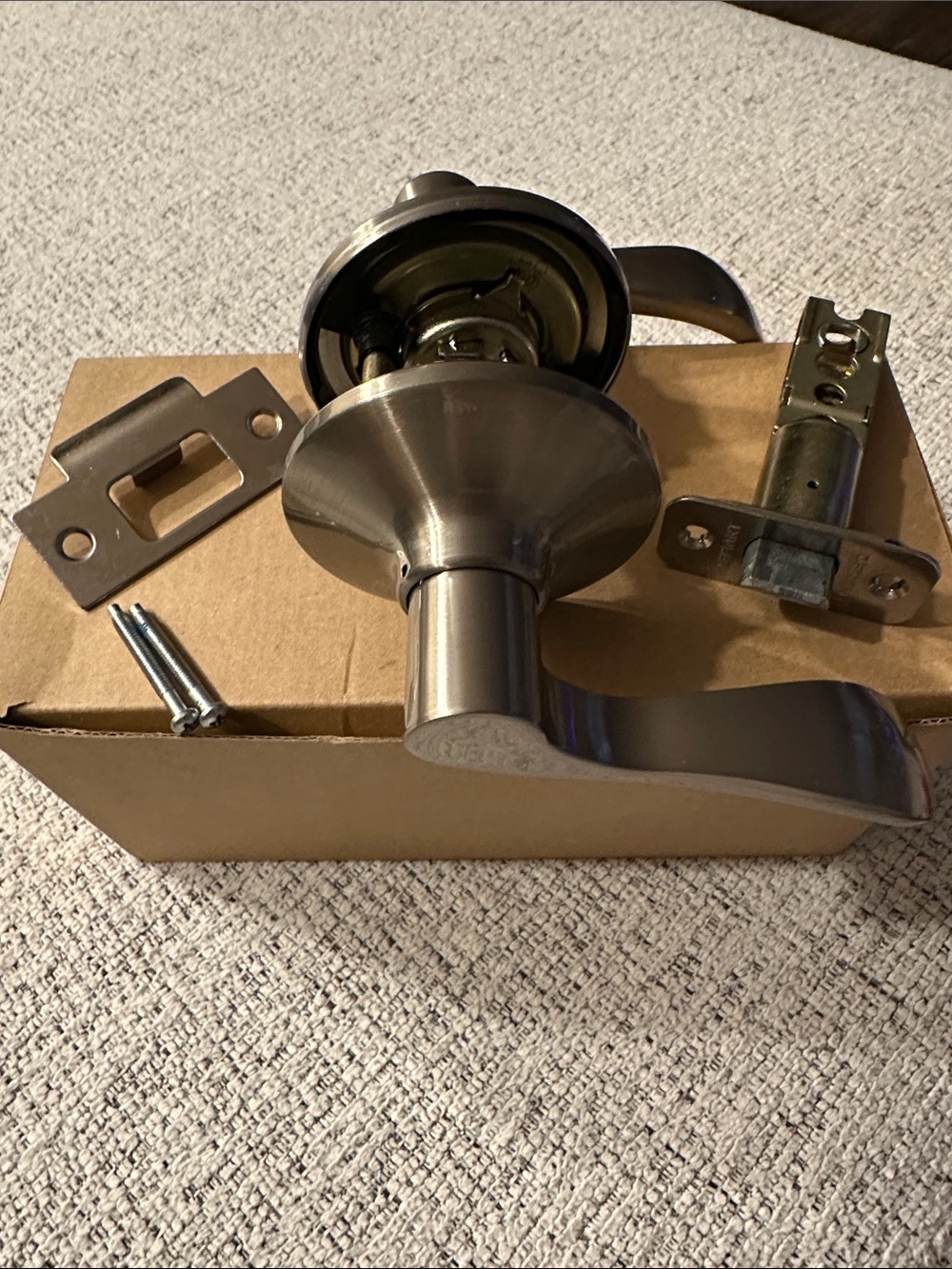 Brushed Nickel Right-Hand Lever Door Handle with Latch and Strike Plate